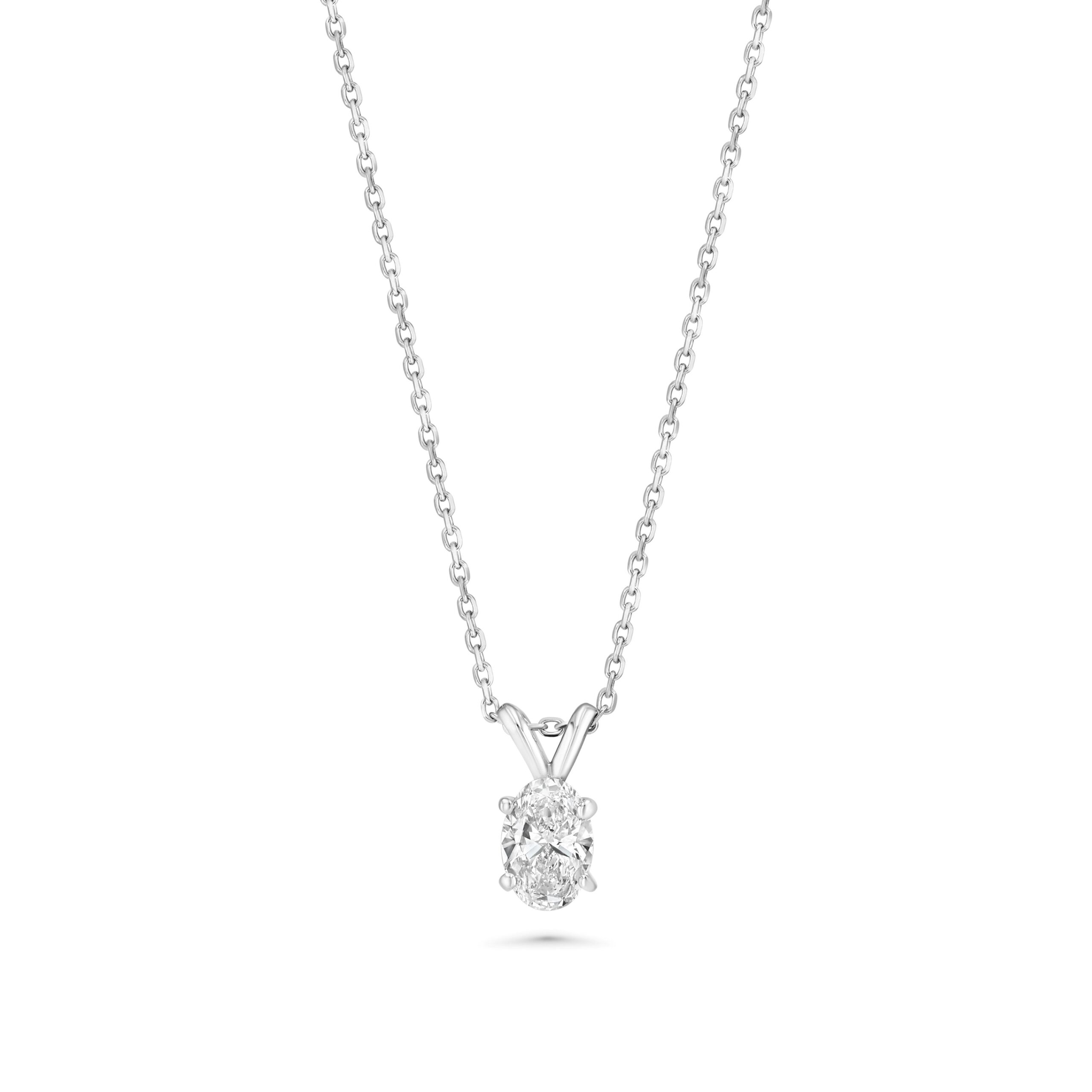0.75 ct oval diamond solitaire pendant necklace in 14K white gold with four‑prong setting by Renacci Jewelry