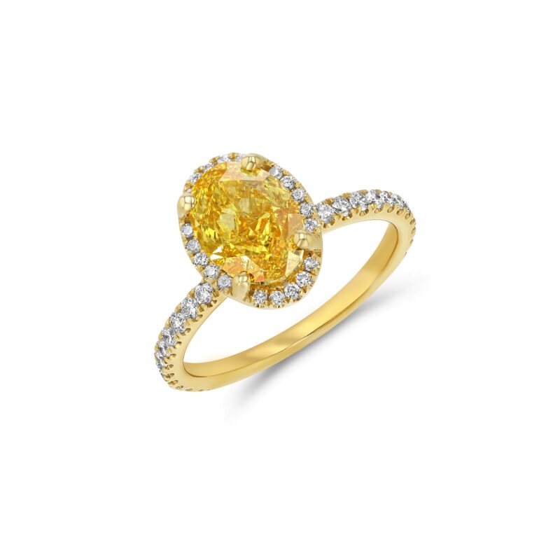 2.58 ct oval yellow diamond halo ring in 14K yellow gold with round diamond accents on the band by Renacci Jewelry